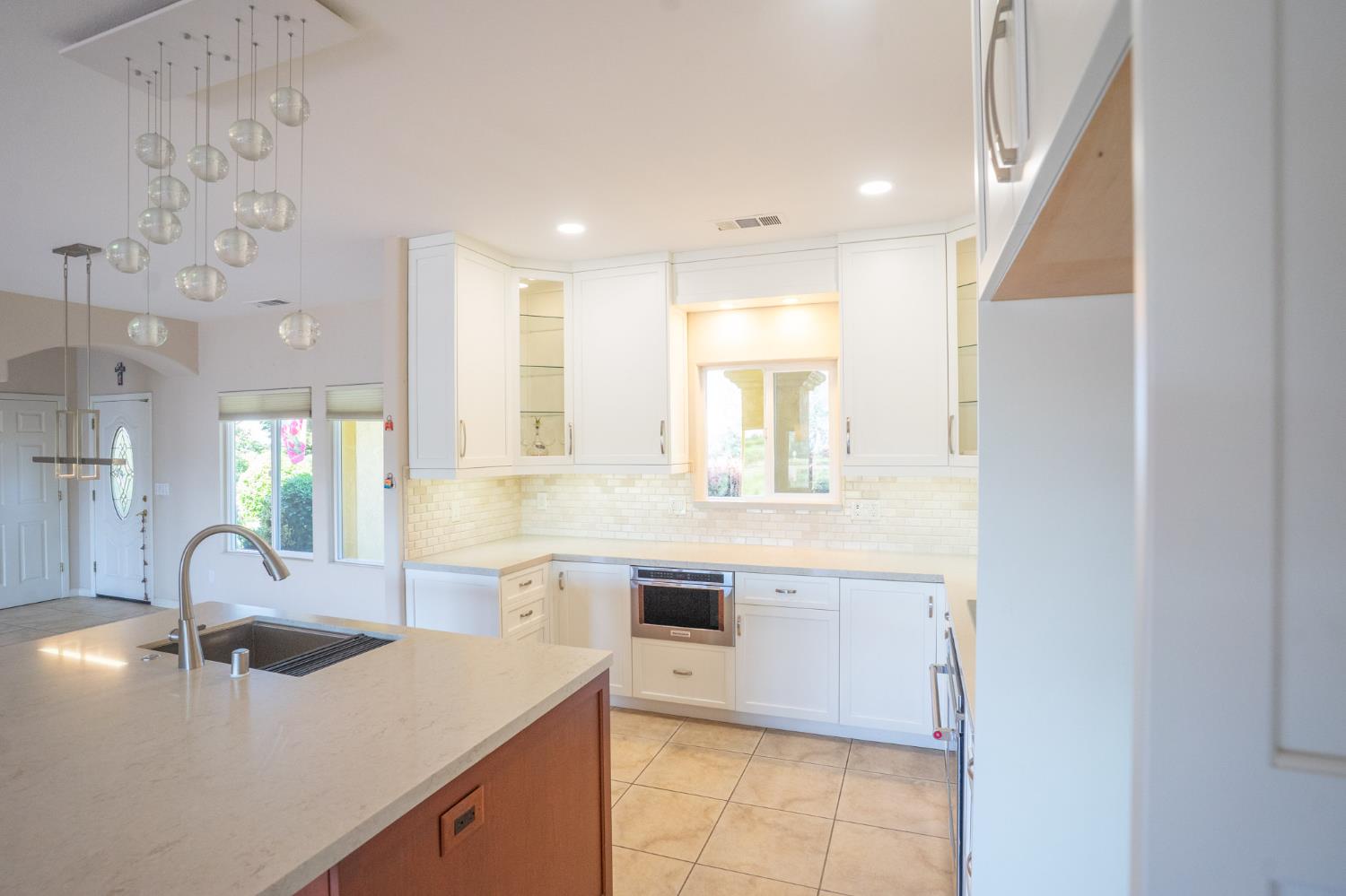 3235 Hagen Road Valley Springs, CA 95252 - Photo 14 of 56 a kitchen with a sink cabinets and window