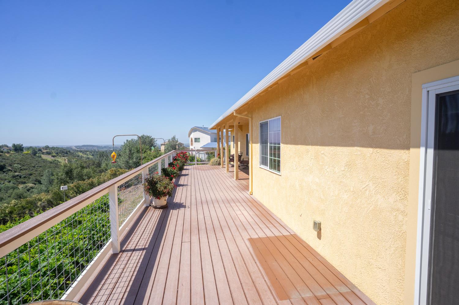 3235 Hagen Road Valley Springs, CA 95252 - Photo 33 of 56 a view of balcony with wooden floor and fence
