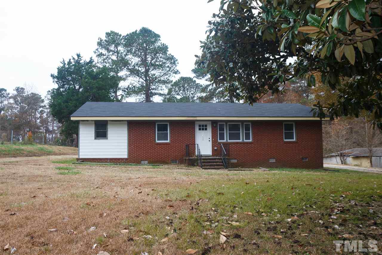 5300 Rock Quarry Road Raleigh, NC 27610 - Photo 2 of 19 a view of a house with a yard