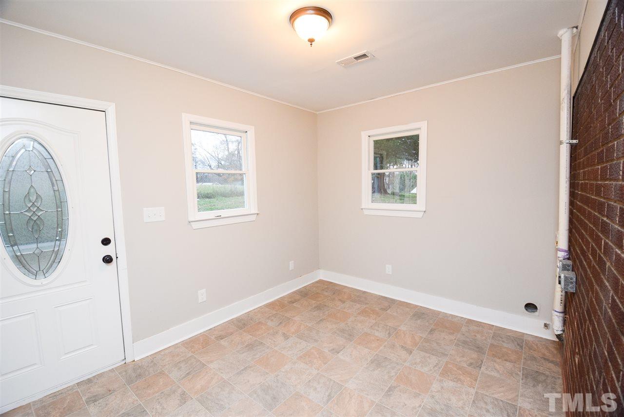 5300 Rock Quarry Road Raleigh, NC 27610 - Photo 5 of 19 an empty room with windows and closet