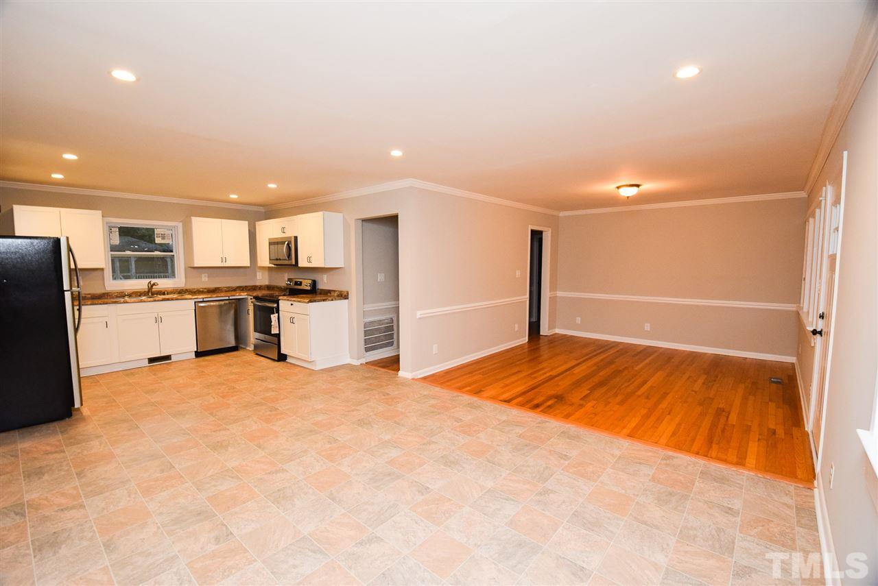 5300 Rock Quarry Road Raleigh, NC 27610 - Photo 6 of 19 a view of a kitchen with a stove