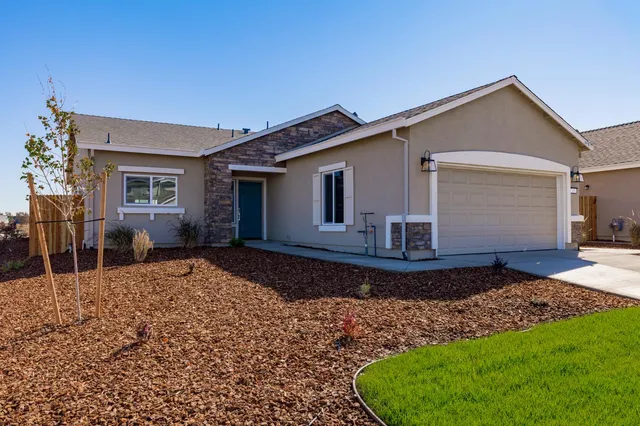 a view of a house with a patio