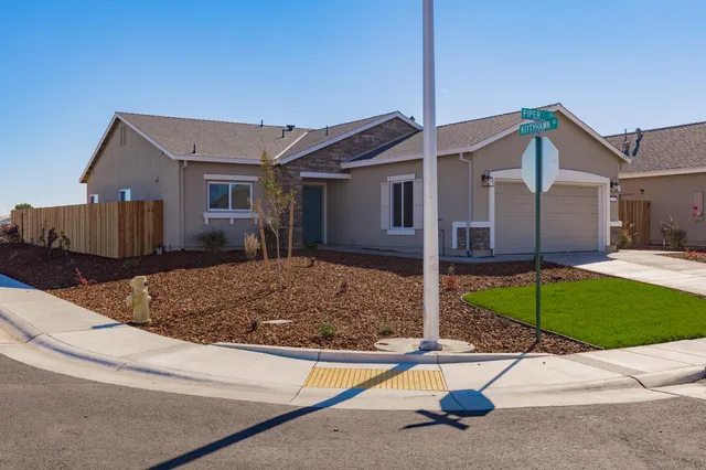 a house view with a outdoor space