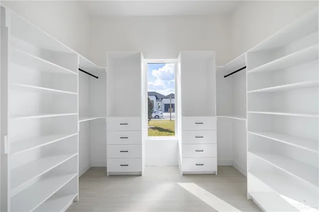 a view of an empty walk in closet