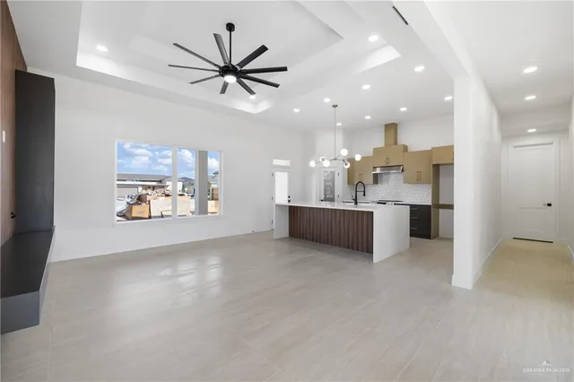 a view of a kitchen and a kitchen