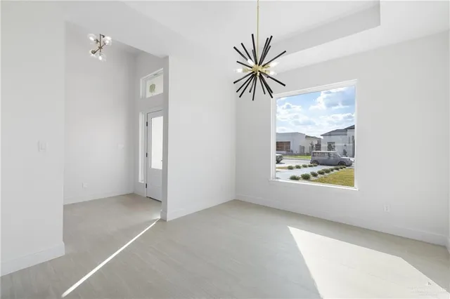 a view of an empty room and window