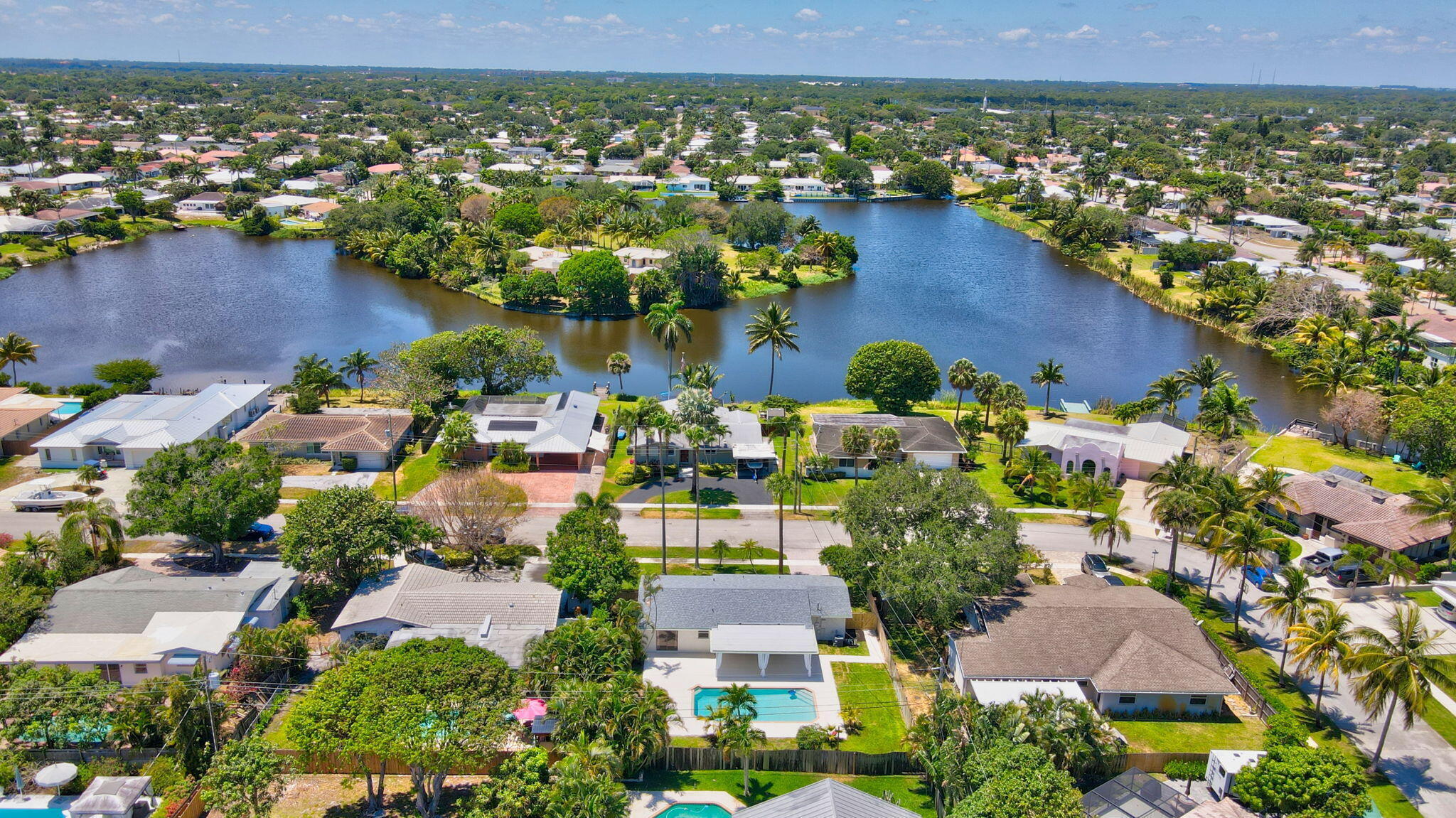 832 Southwest 10th Avenue Boca Raton, FL 33486 - Photo 44 of 57 an aerial view of residential houses with outdoor space