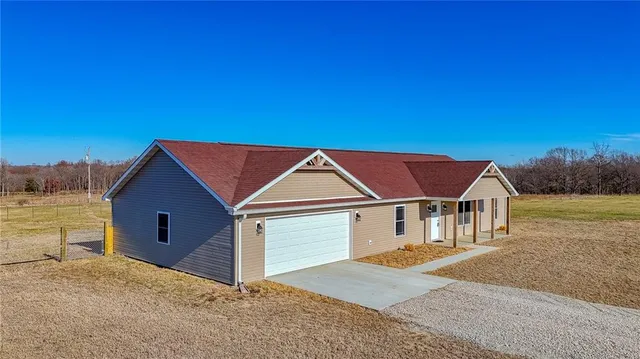 $359,900 | 815 Southwest 520th Road, Holden, MO 64040