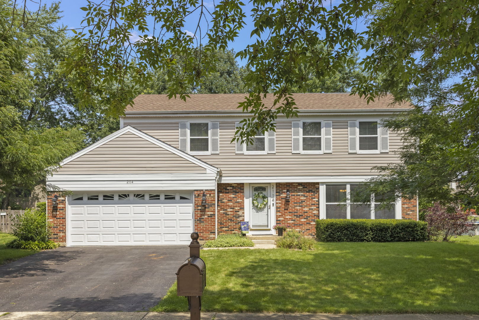 front view of a house and a yard