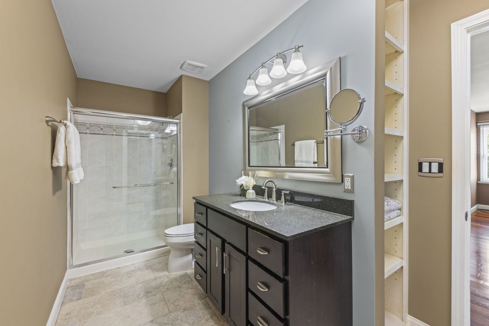 2114 Countryside Circle Naperville, IL 60565 - Photo 18 of 29 a bathroom with a sink a toilet and shower