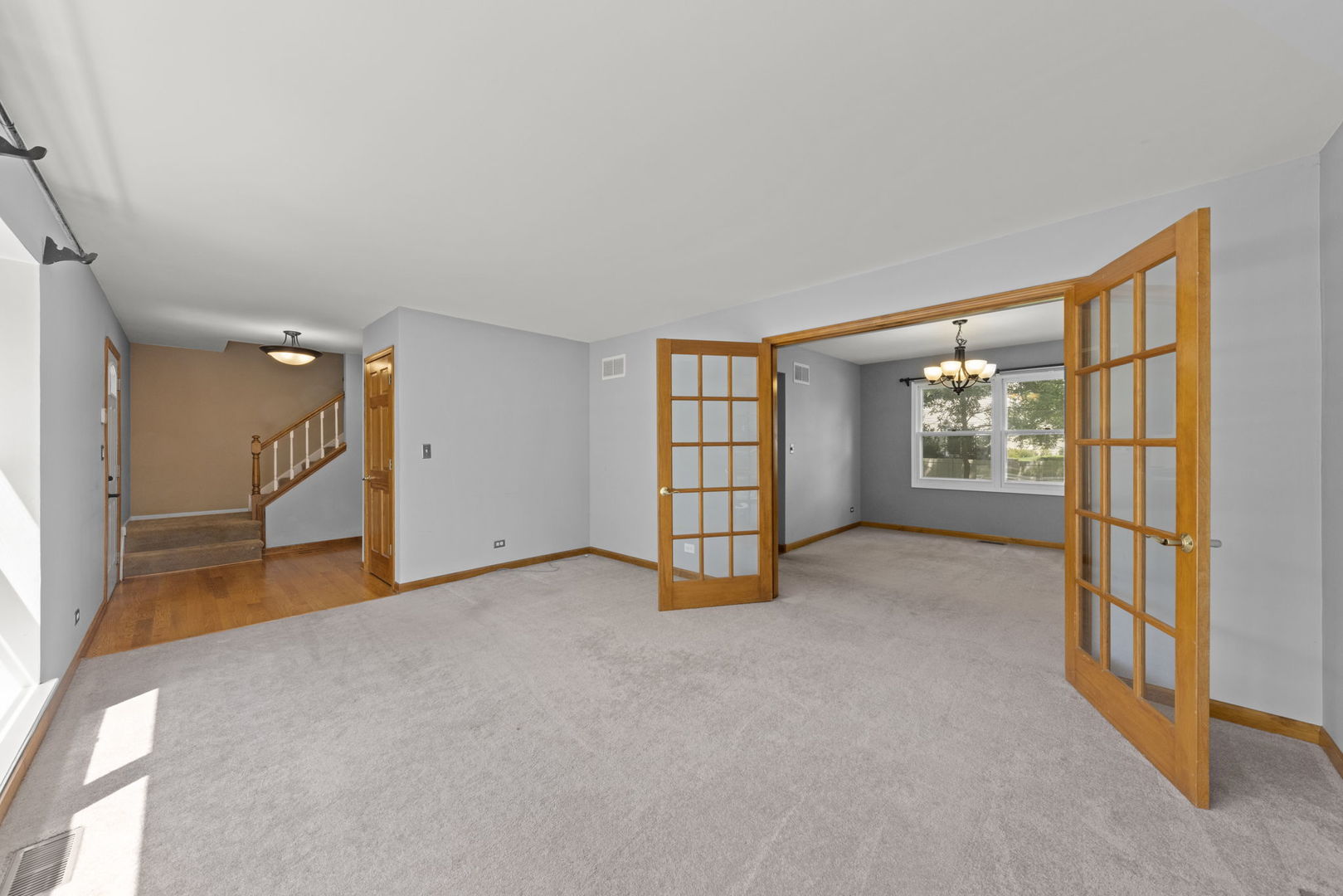 2114 Countryside Circle Naperville, IL 60565 - Photo 4 of 29 a view of an empty room with a window