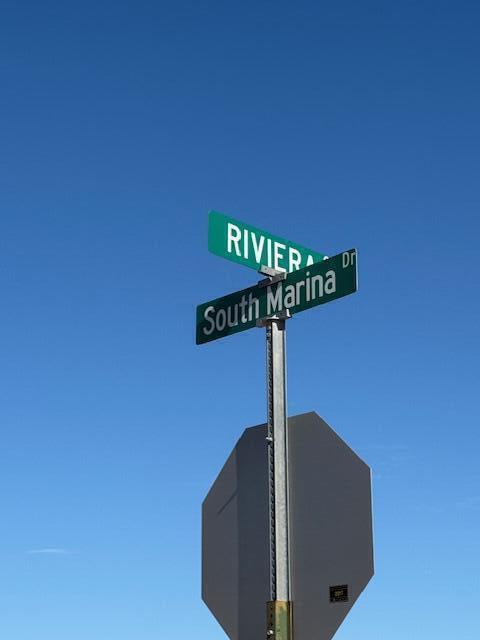 1188 Riviera Circle Thermal, CA 92274 - Photo 3 of 11 a street sign on a pole