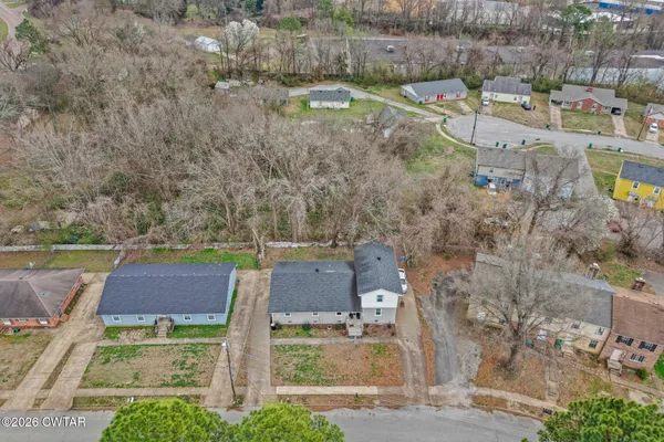 an aerial view of residential house with outdoor space