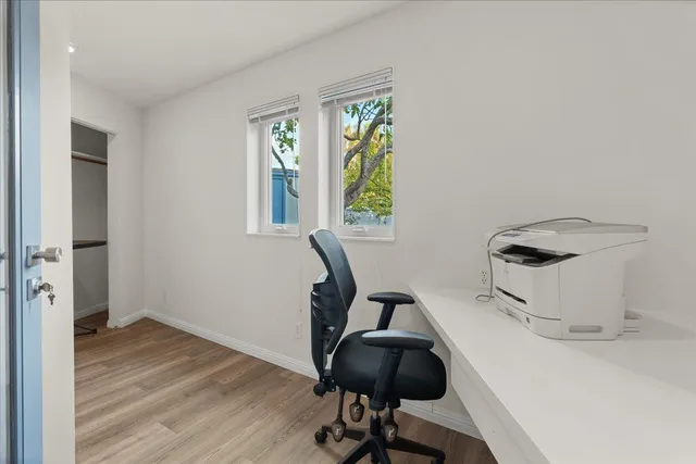 an aerial view of a house with a garden