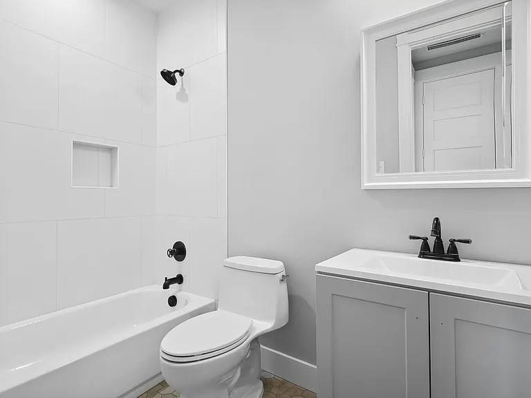 134 Crawford Road Argyle, TX 76226 - Photo 13 of 13 a white toilet sitting next to a bathroom sink