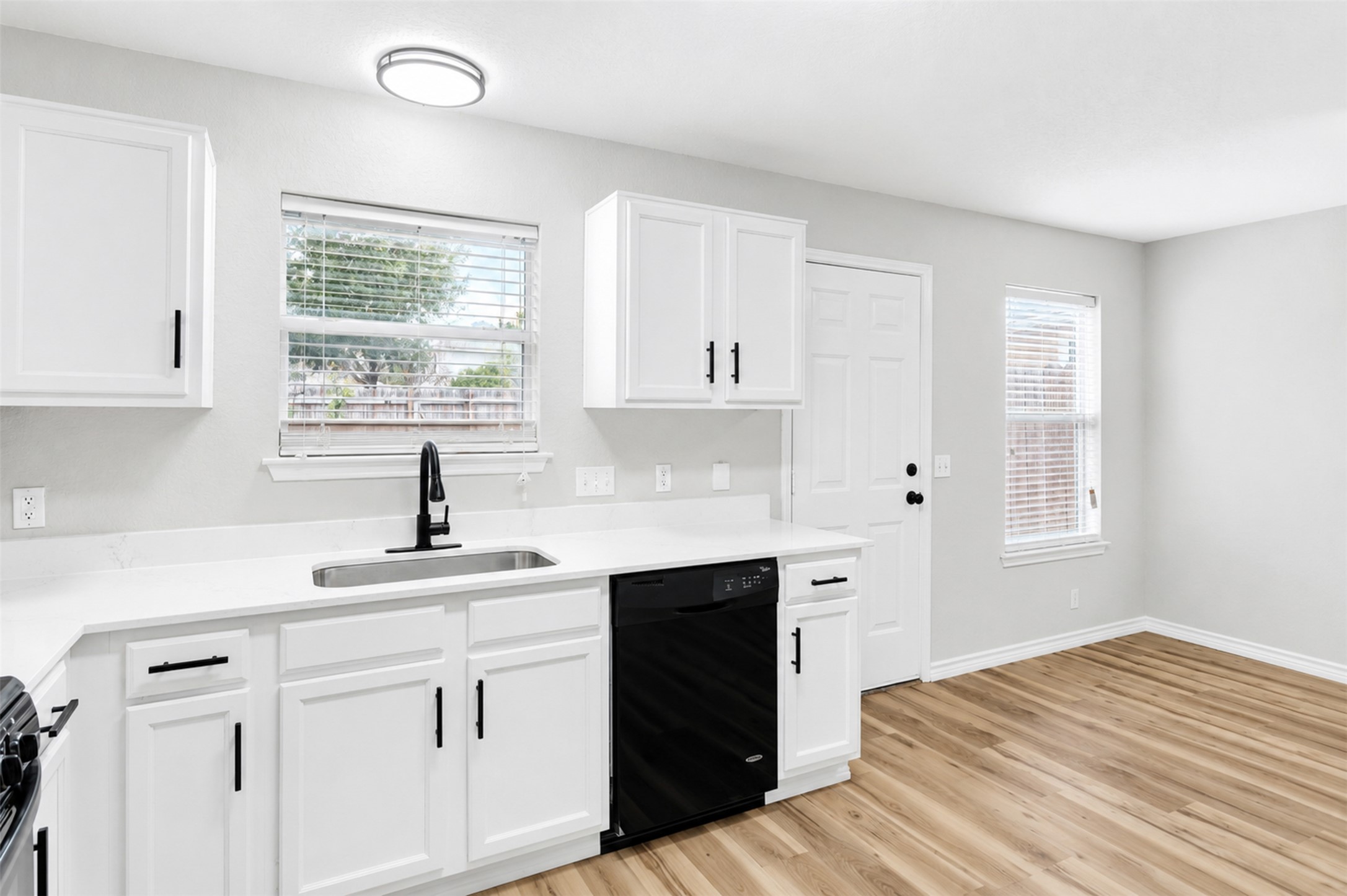 4523 Secure Lane Austin, TX 78725 - Photo 16 of 40 Clean lines and bright finishes create a welcoming atmosphere in this thoughtfully designed kitchen space.