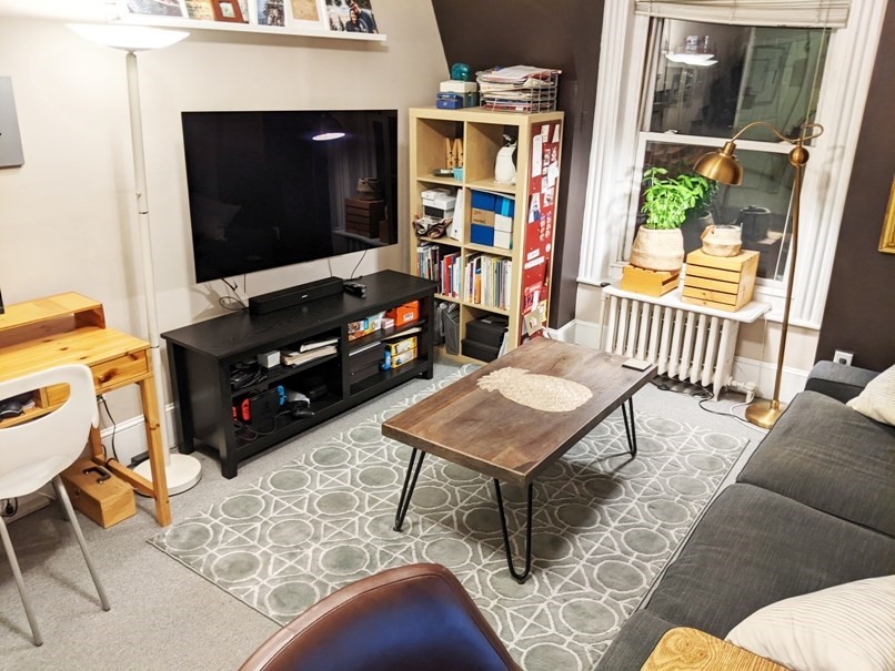 471 Commonwealth Avenue, Unit 4F Boston, MA 02215 - Photo 4 of 9 a living room with furniture and a flat screen tv