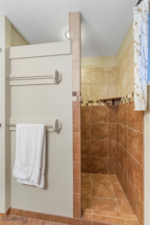 3033 Wes Davis Road Belgrade, MT 59714 - Photo 41 of 91 Walk-in tiled shower in basement bathroom