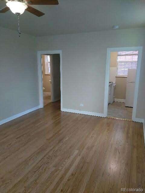 2966 West Denver Place Denver, CO 80211 - Photo 6 of 6 a view of wooden floor and windows in a room