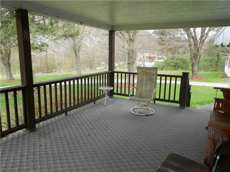 761 Lone Pine Road Amity, PA 15311 - Photo 12 of 19 Exterior Front. Huge 20 x 12 covered front porch-great for relaxing.