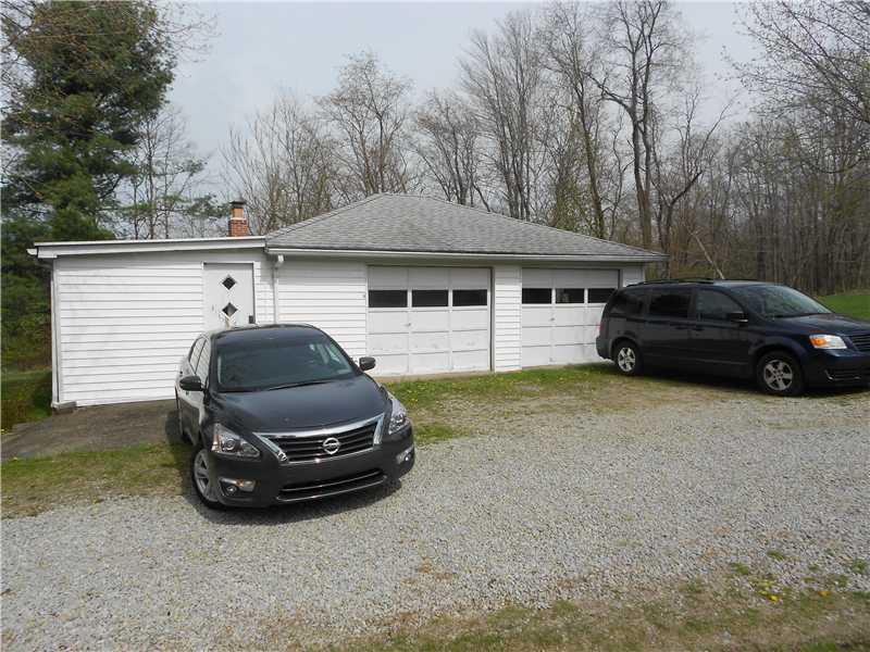 761 Lone Pine Road Amity, PA 15311 - Photo 15 of 19 Parking Lot/Garage. Large 2 car garage plus add l storage/workspace.
