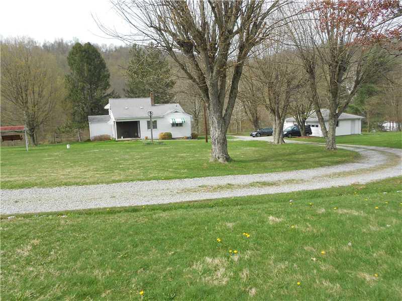 761 Lone Pine Road Amity, PA 15311 - Photo 4 of 19 Exterior Back. Driveway is in the process of being paved...great perk!