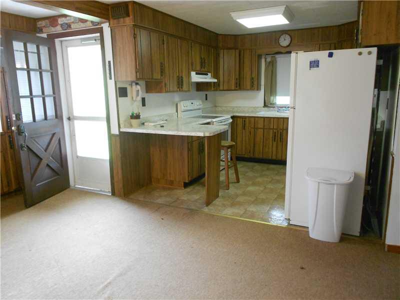 761 Lone Pine Road Amity, PA 15311 - Photo 6 of 19 Kitchen. Efficient kitchen opens to dining room...lots of light.