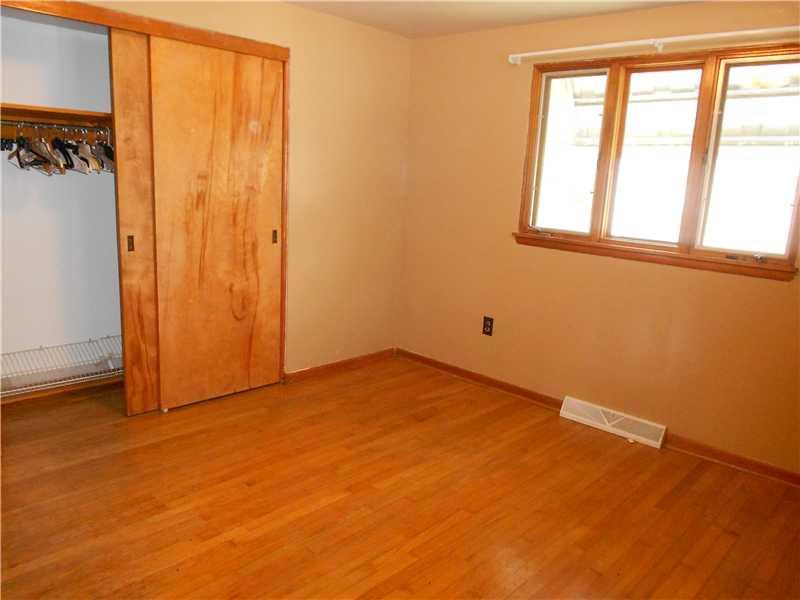 761 Lone Pine Road Amity, PA 15311 - Photo 10 of 19 Bedroom. Gleaming hard wood floors and nice wood trim. 2 first floor bedrooms.