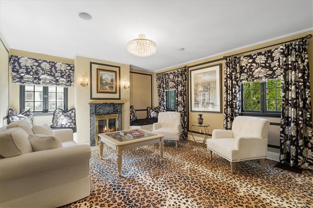 430 Woodland Road Sewickley, PA 15143 - Photo 21 of 49 a living room with furniture and a large window
