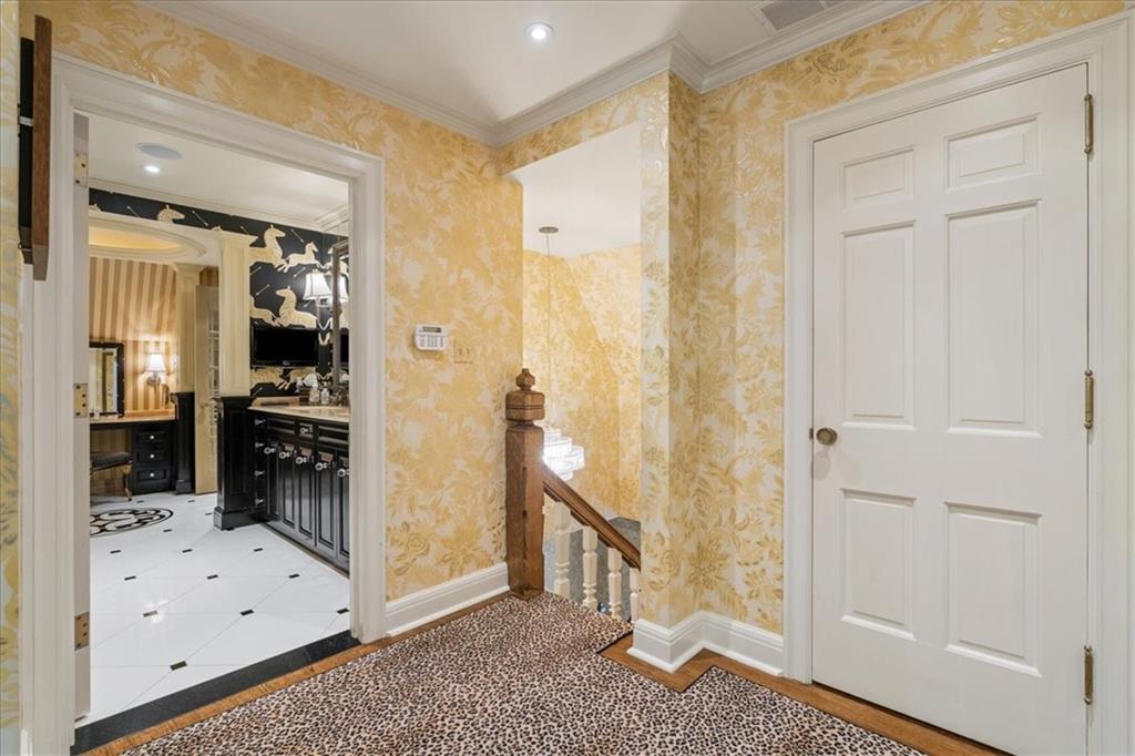 430 Woodland Road Sewickley, PA 15143 - Photo 27 of 49 a view of a hallway with wooden floor and staircase