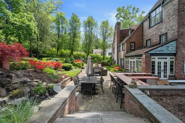 a view of a tables and chairs on the patio