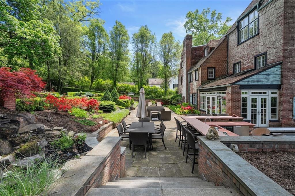 430 Woodland Road Sewickley, PA 15143 - Photo 41 of 49 a view of a house with backyard and sitting area