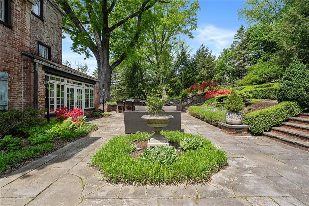 430 Woodland Road Sewickley, PA 15143 - Photo 46 of 49 a view of a garden with patio