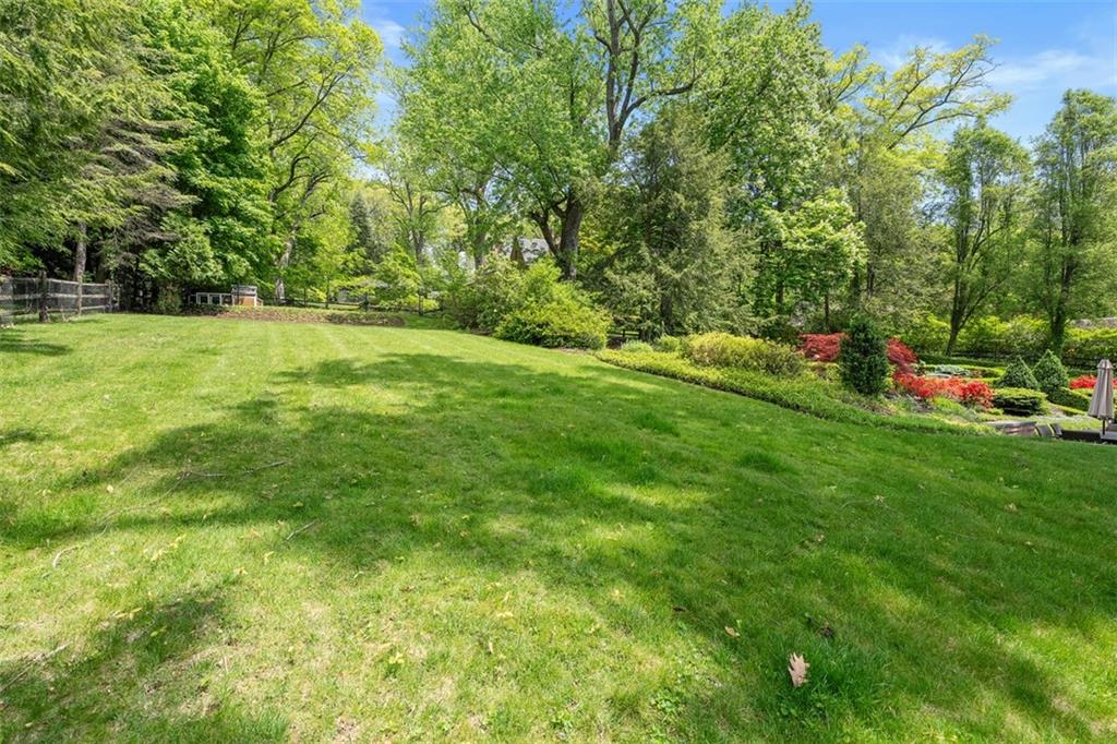 430 Woodland Road Sewickley, PA 15143 - Photo 48 of 49 a view of green field with trees in the background