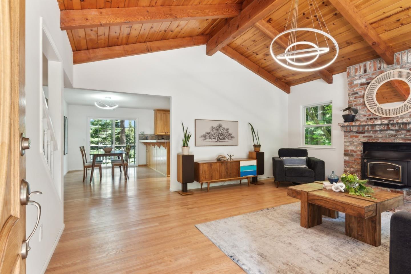 141 William Way Felton, CA 95018 - Photo 11 of 54 a living room with furniture and a fireplace