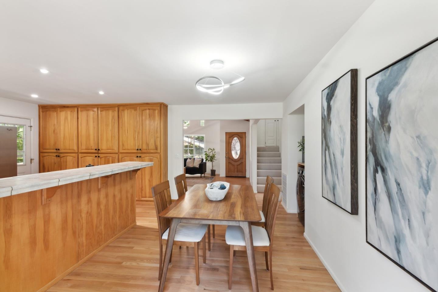 141 William Way Felton, CA 95018 - Photo 15 of 54 a view of a dining room with furniture window and wooden floor