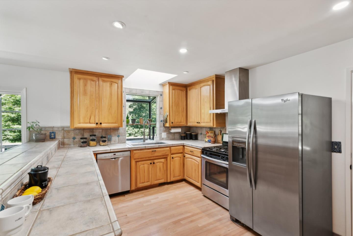 141 William Way Felton, CA 95018 - Photo 17 of 54 a kitchen with stainless steel appliances granite countertop a sink a stove and refrigerator