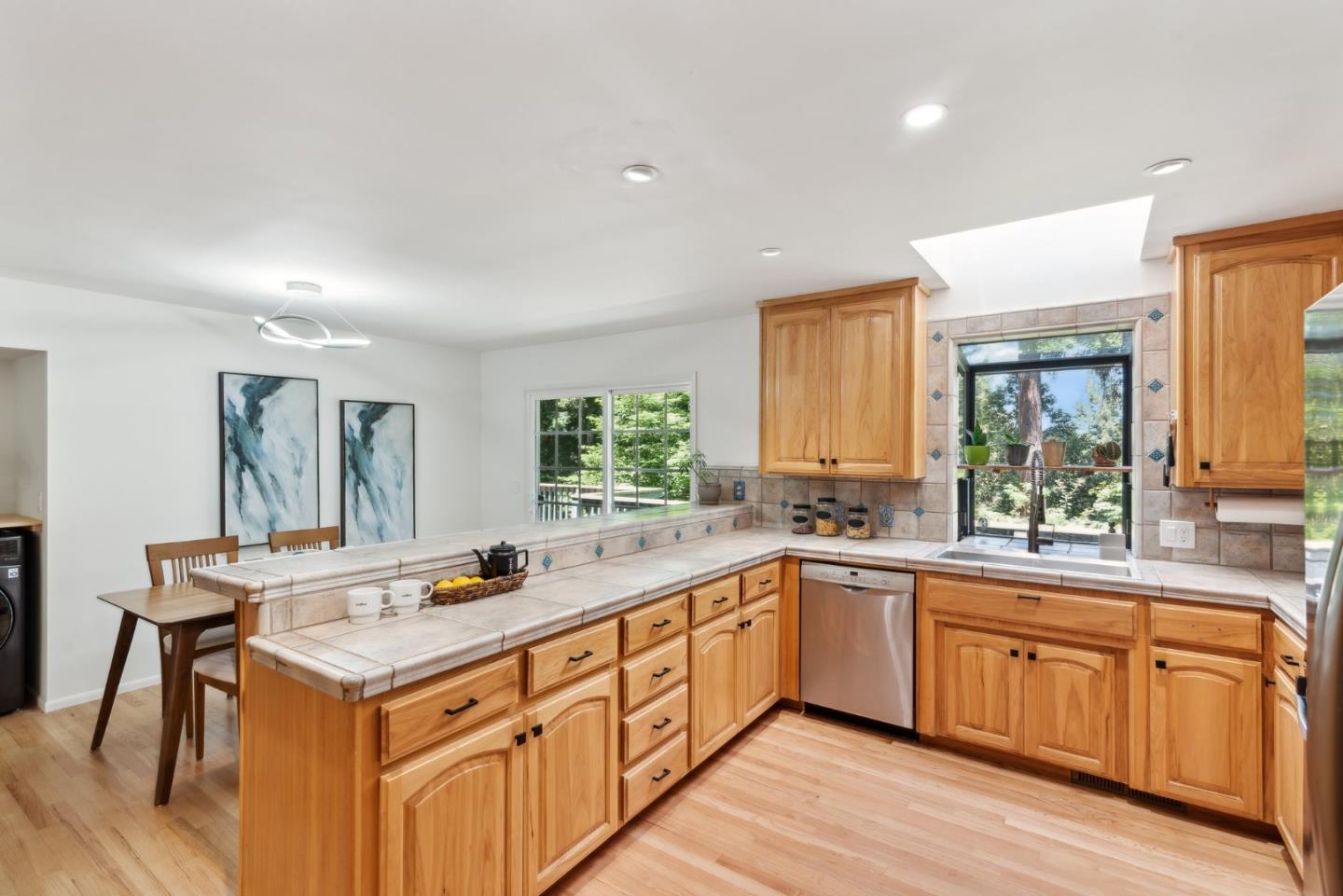 141 William Way Felton, CA 95018 - Photo 18 of 54 a kitchen with a sink stove and cabinets