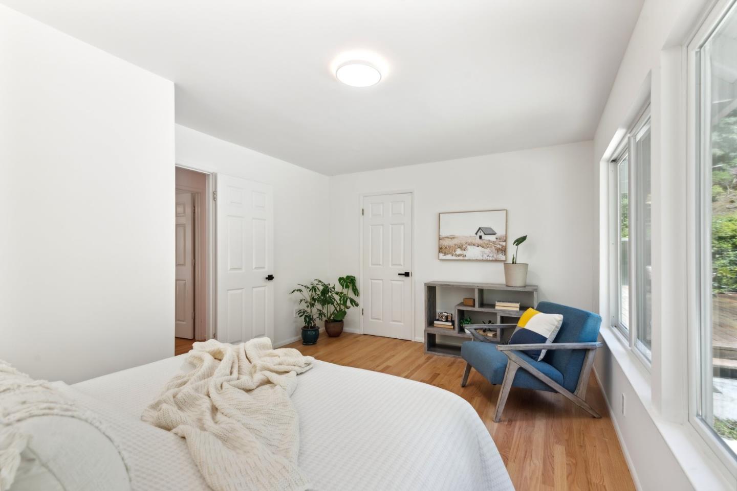 141 William Way Felton, CA 95018 - Photo 34 of 54 a bedroom with a bed and a table in it