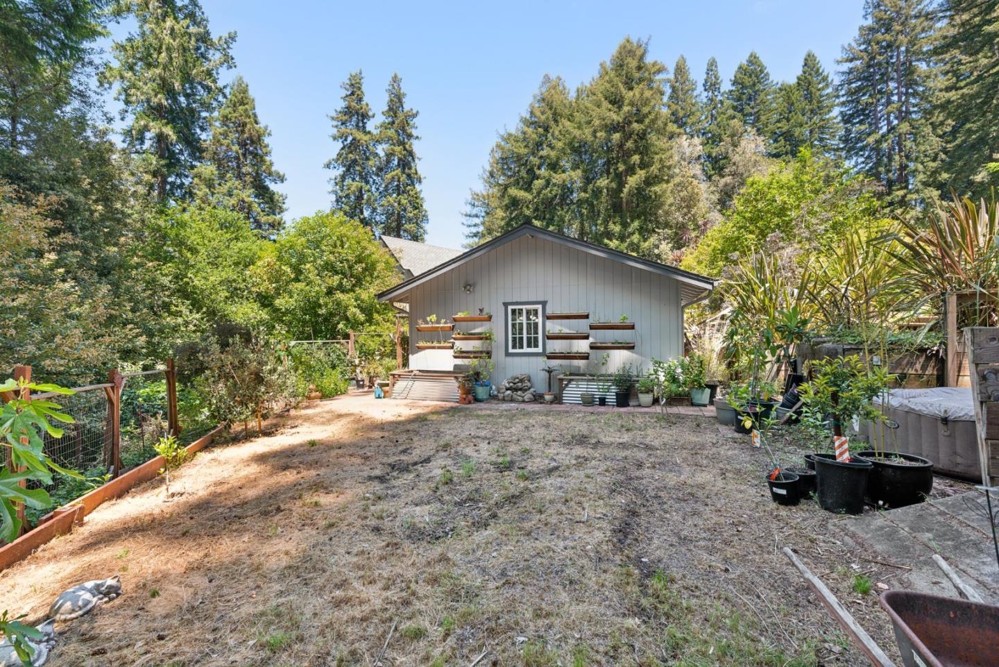 141 William Way Felton, CA 95018 - Photo 45 of 54 a view of a house with a yard and trees