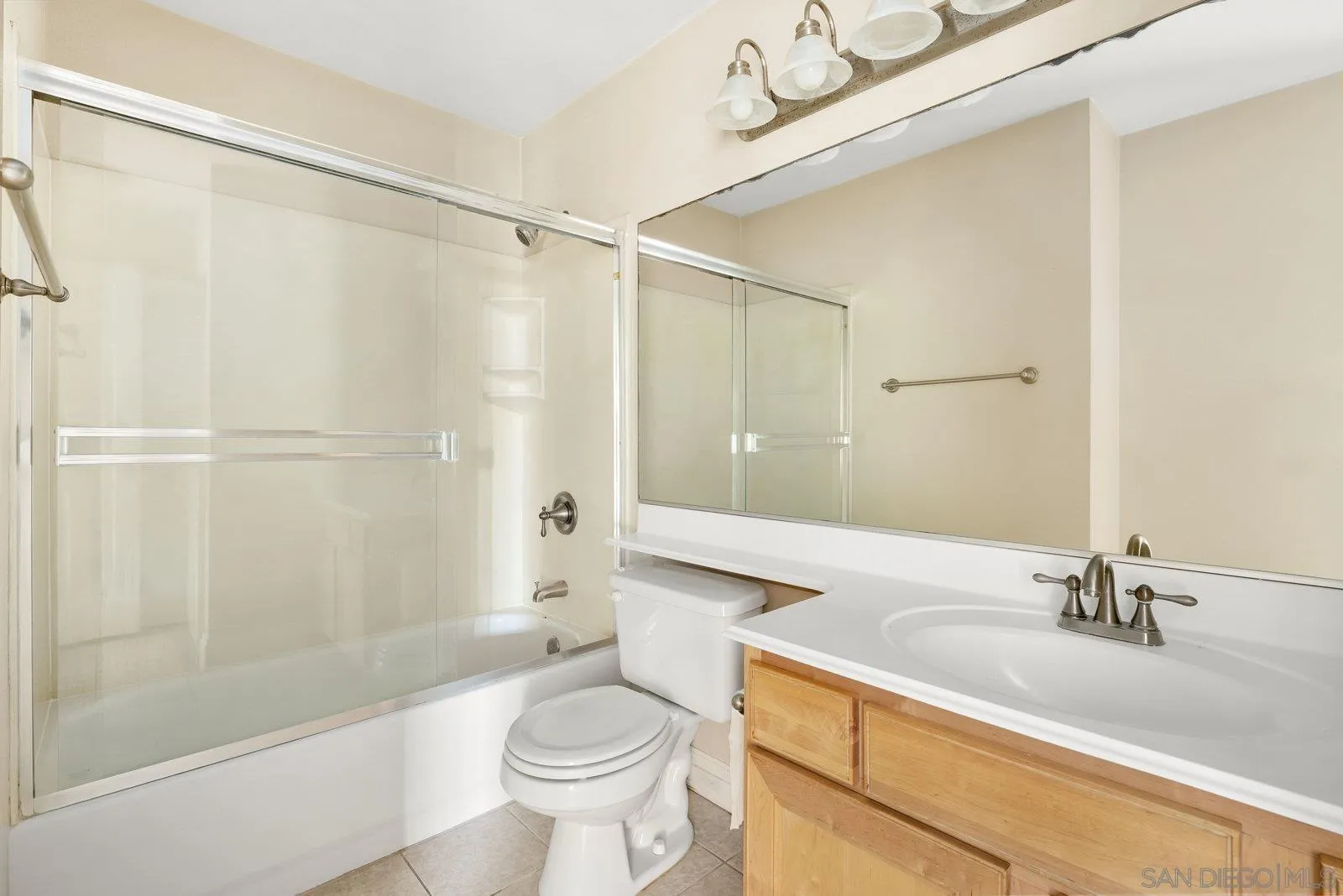 1045 Peach Avenue, Unit 59 El Cajon, CA 92021 - Photo 11 of 19 a bathroom with a sink a toilet and a shower