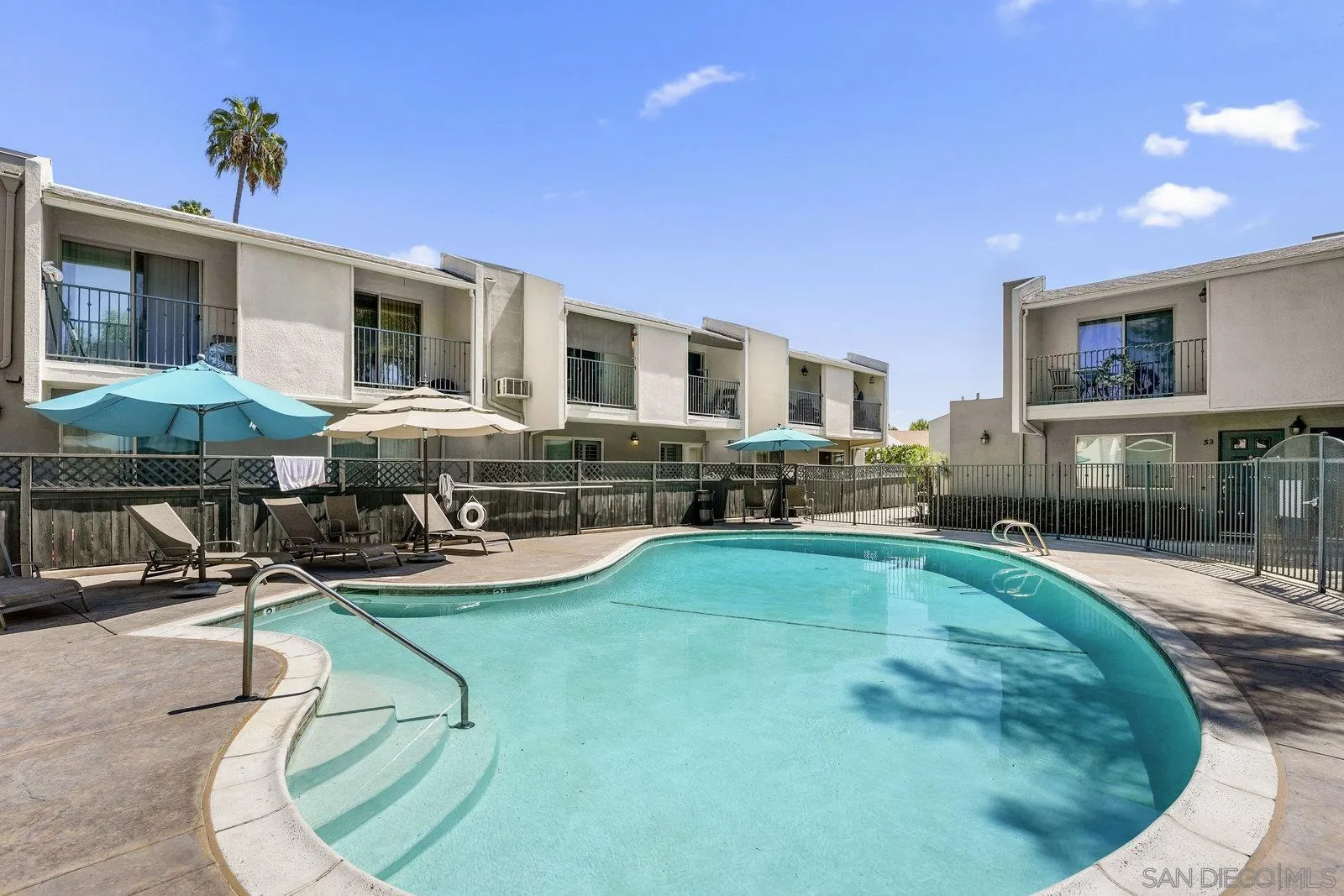 1045 Peach Avenue, Unit 59 El Cajon, CA 92021 - Photo 15 of 19 a living room with furniture pool table and a fireplace