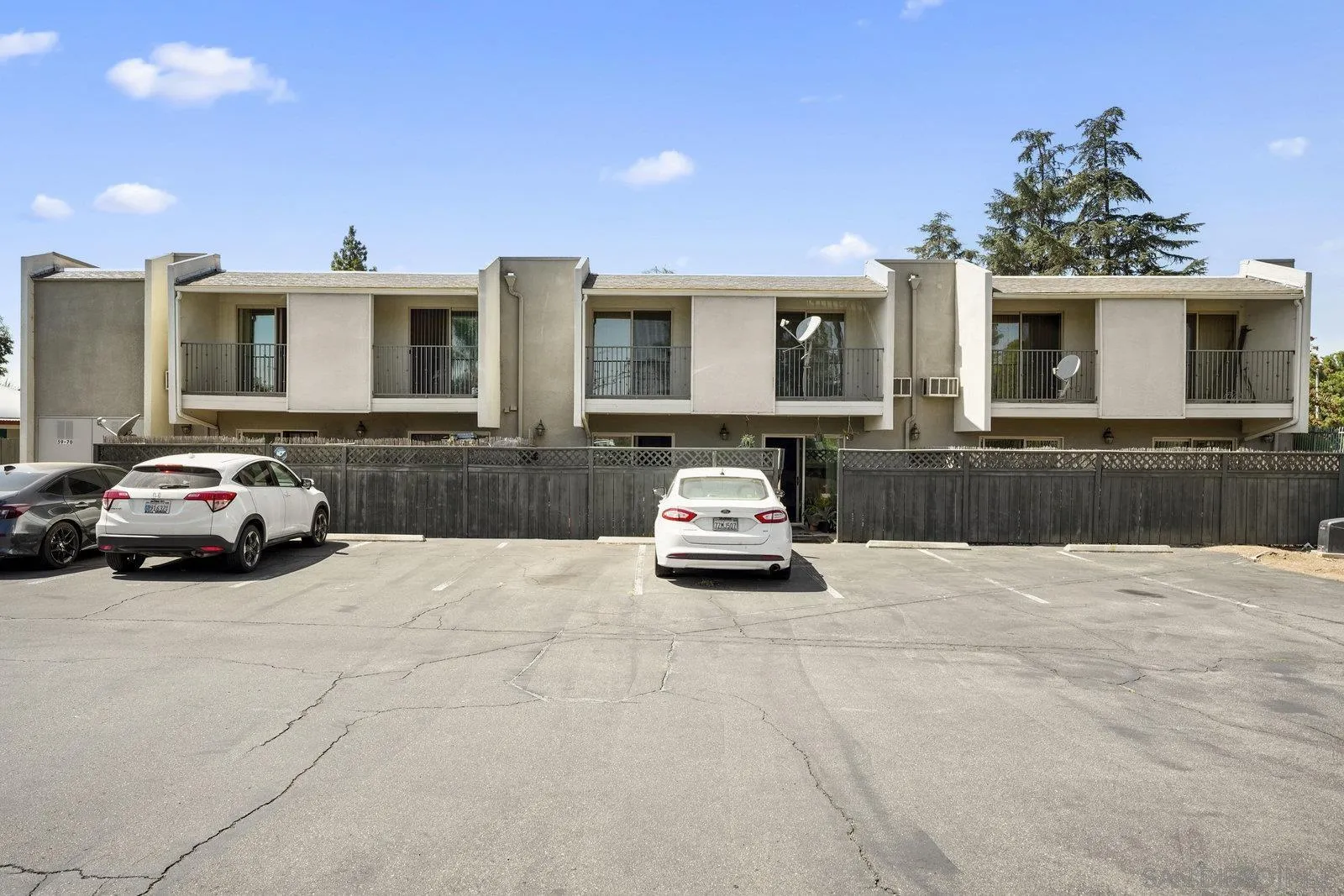 1045 Peach Avenue, Unit 59 El Cajon, CA 92021 - Photo 16 of 19 a car parked in front of house