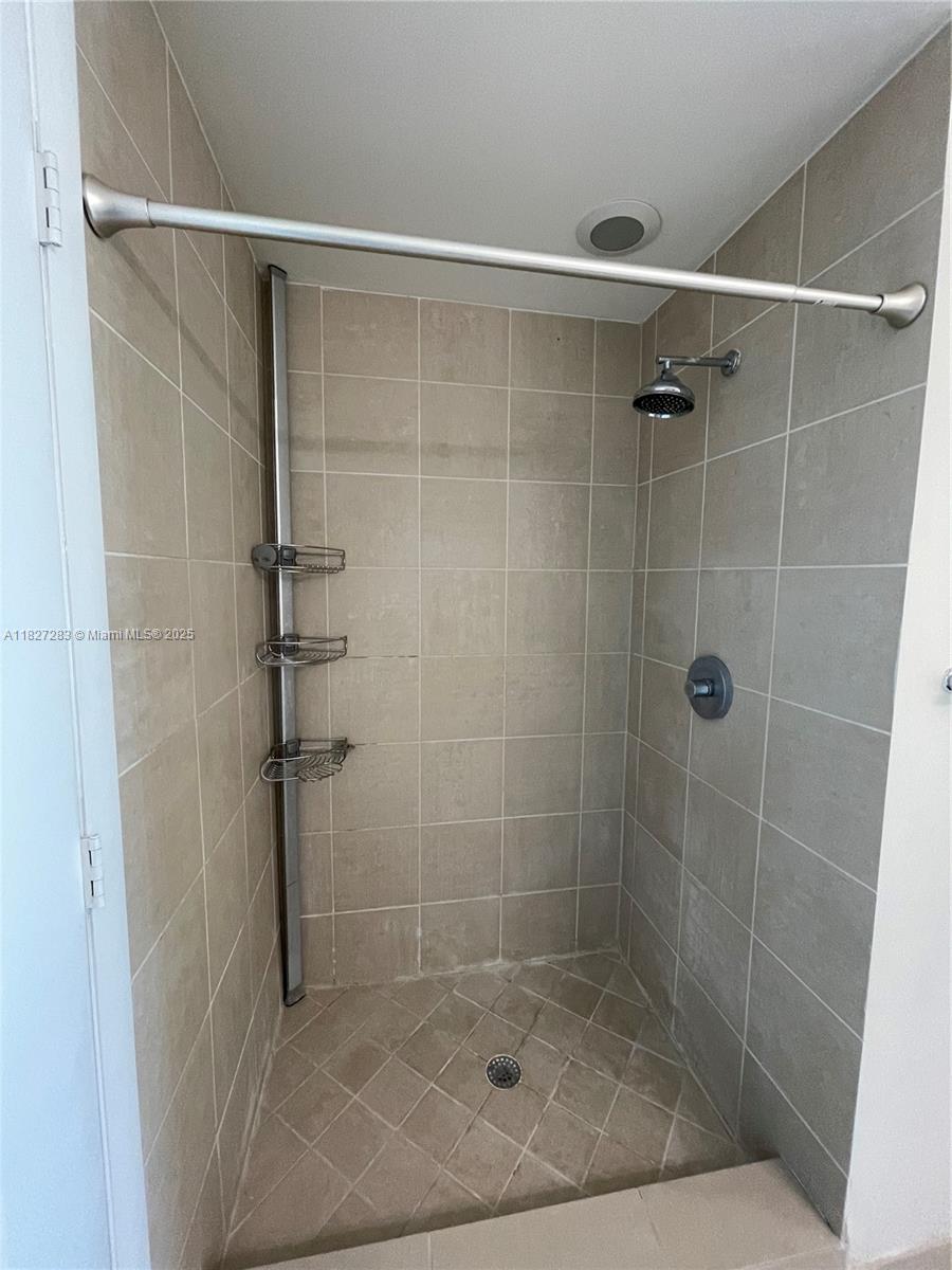 Edgewater Miami, FL 33137 - Photo 17 of 21 a bathroom with a shower