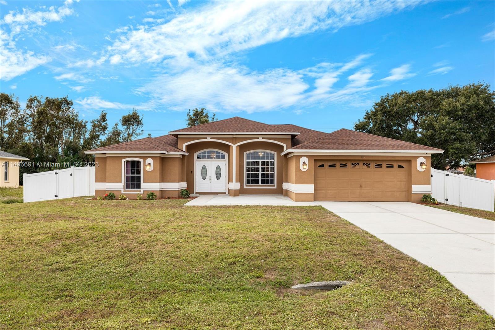 775 Arundel Circle Fort Myers, FL 33913 - Photo 1 of 26 a front view of house with yard and swimming pool