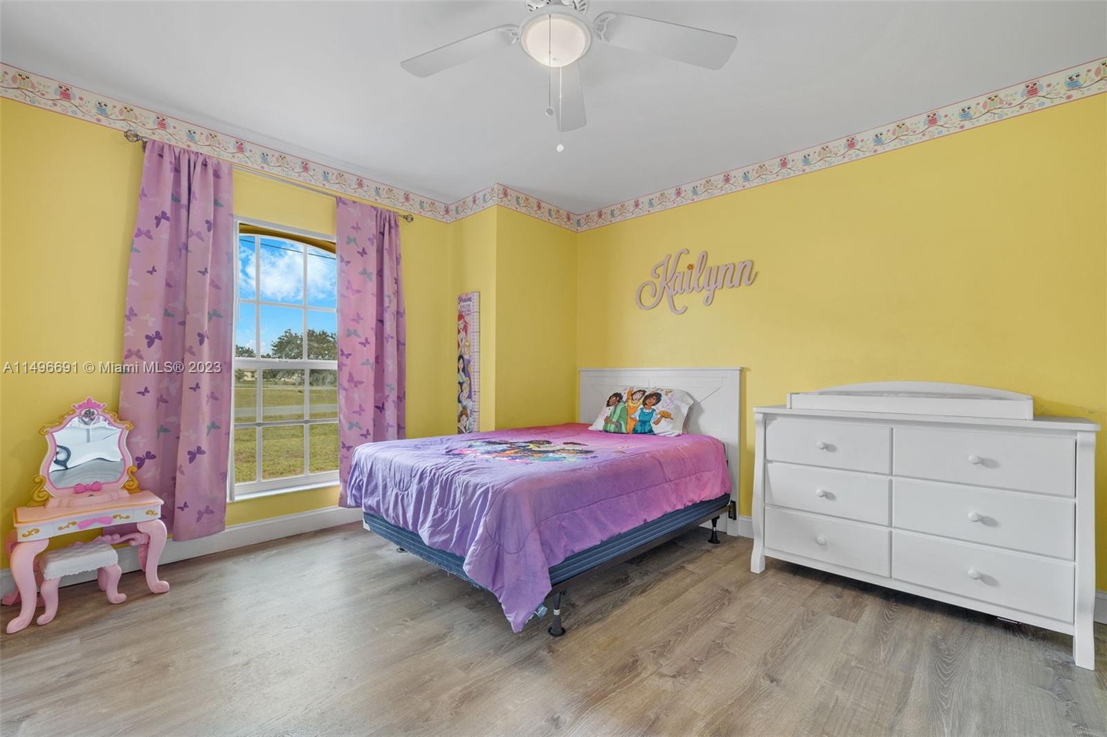 775 Arundel Circle Fort Myers, FL 33913 - Photo 19 of 26 a bedroom with a bed and a dresser