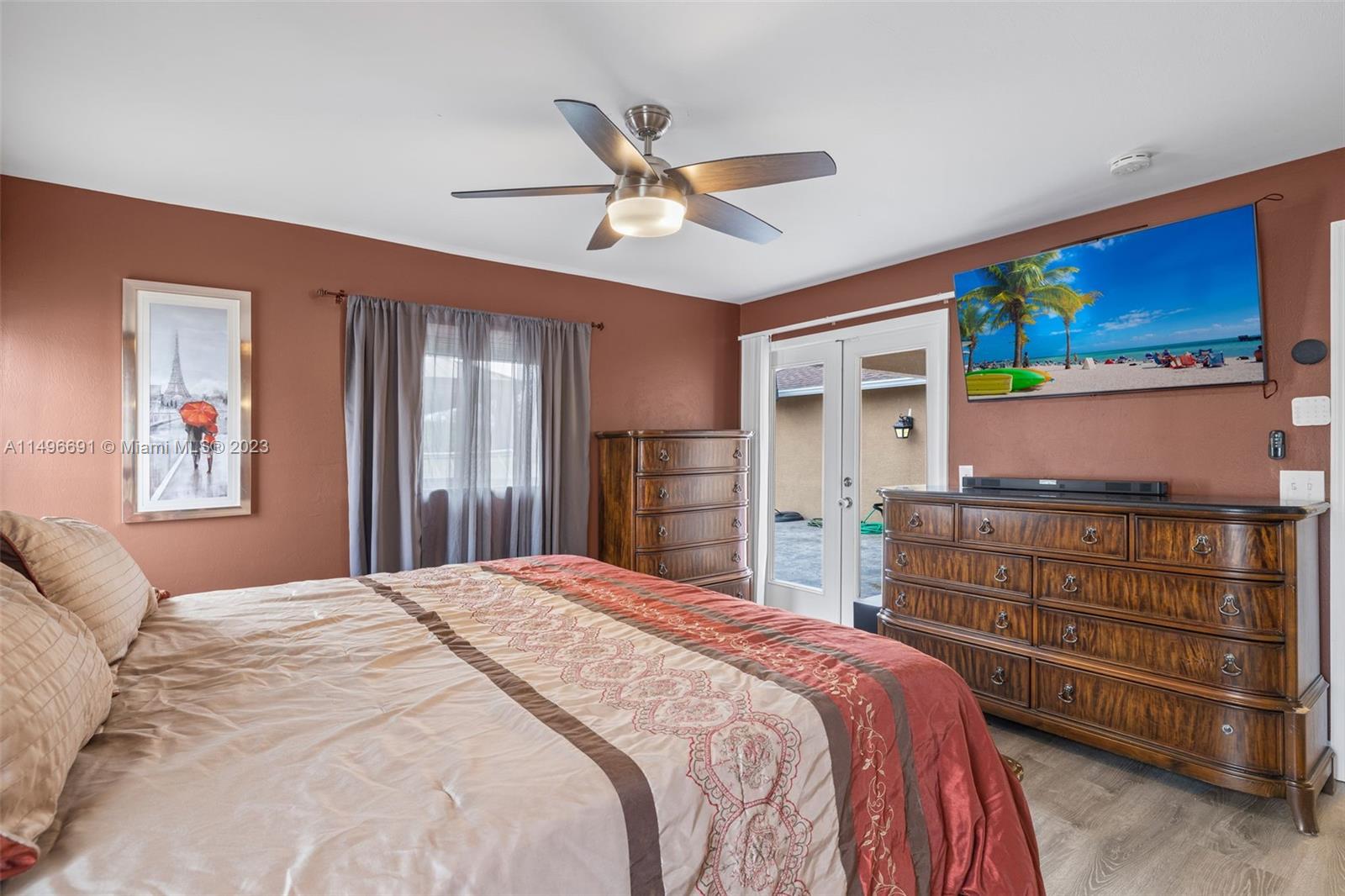 775 Arundel Circle Fort Myers, FL 33913 - Photo 9 of 26 a bedroom with a bed and a dresser