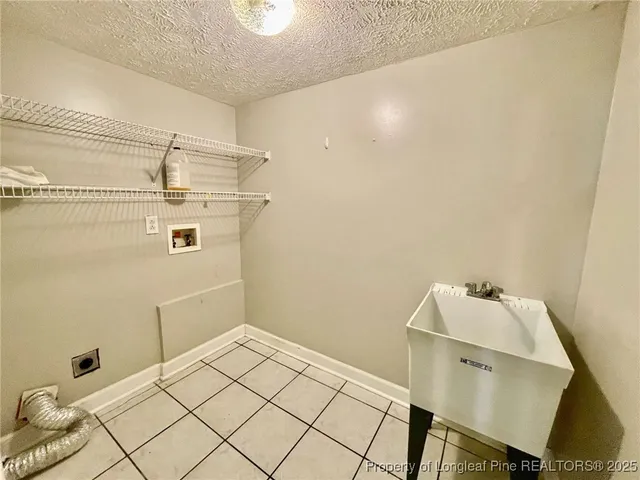 a bathroom with a sink mirror and toilet