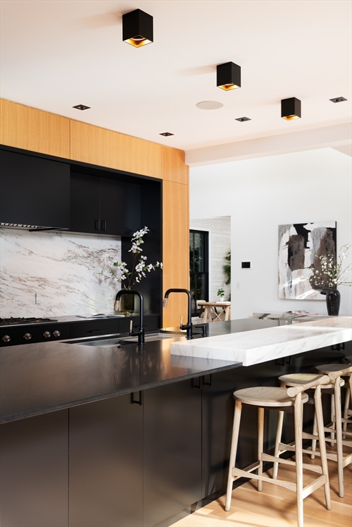 39 Westfield Road Newton, MA 02465 - Photo 12 of 42 a kitchen with a sink and a refrigerator