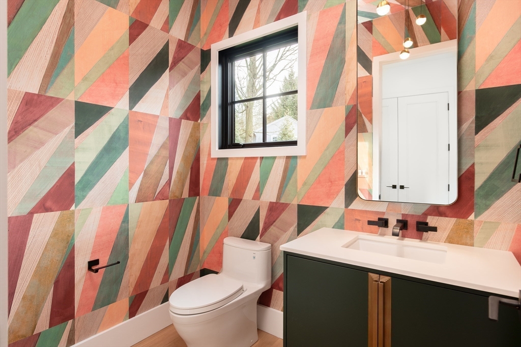 39 Westfield Road Newton, MA 02465 - Photo 15 of 42 a bathroom with a sink and a mirror